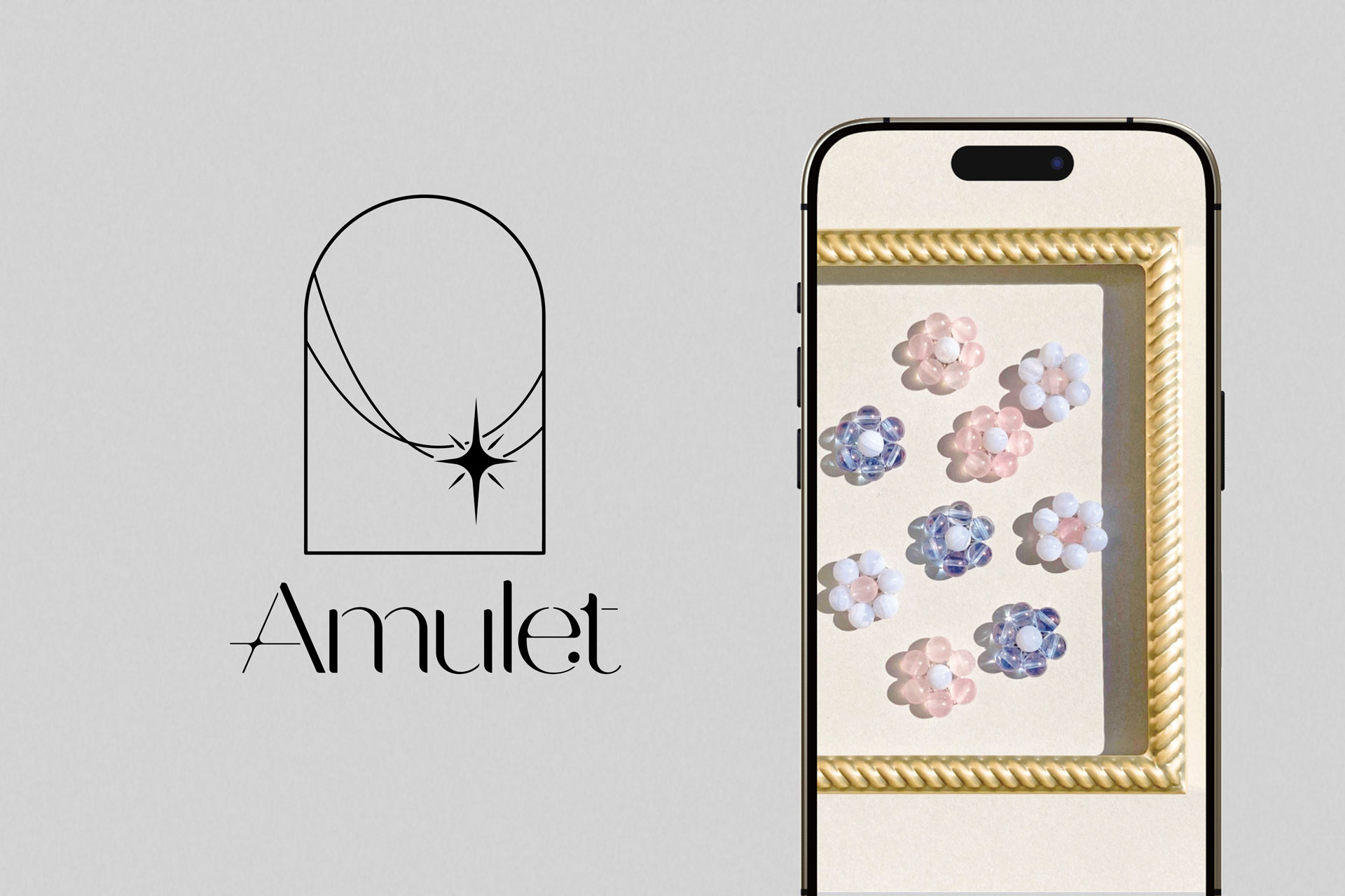 Amuletのロゴとアクセサリーを表示したスマートフォンのモックアップ
